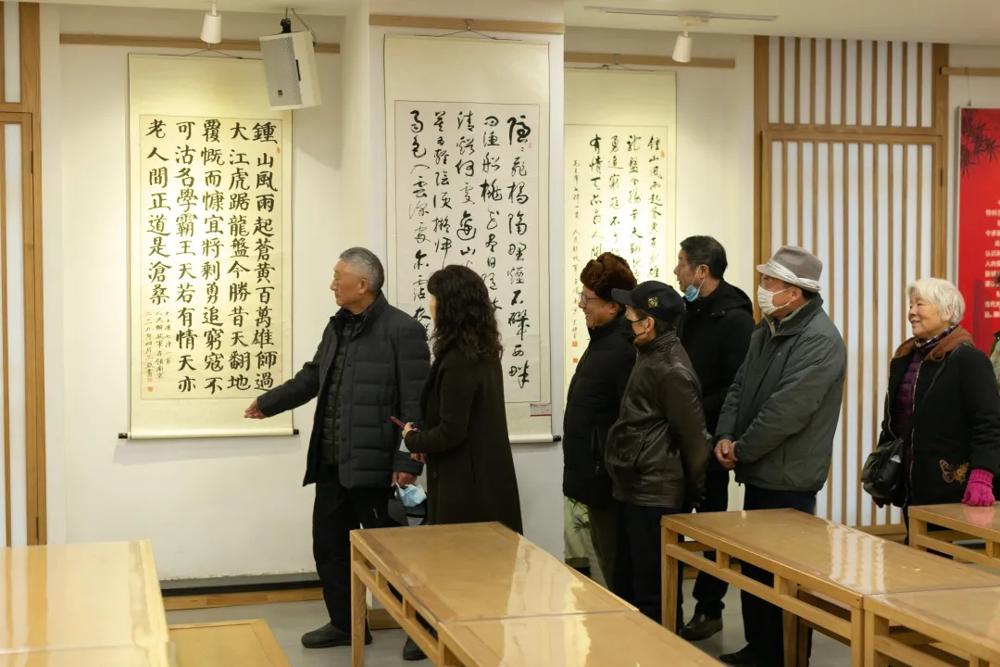 元月12日凤凰街道凤凰街社区开展书法活动迎春街.jpg